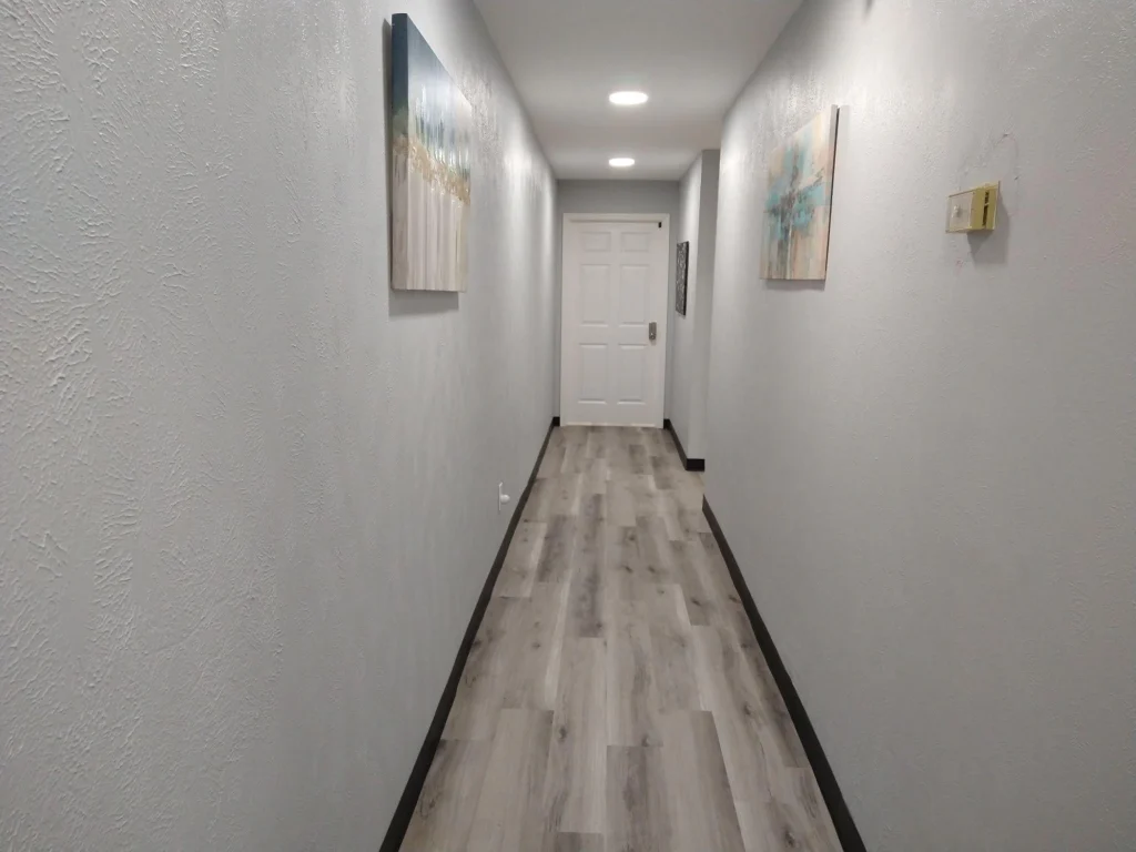 Back hallway leading to rear exit of building