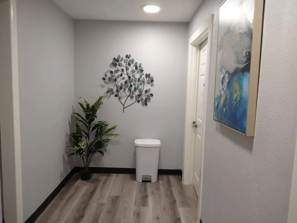 End of hallway, leading to ADA restrooms